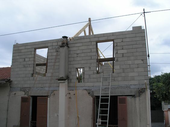 travaux-pavillon-9-demolition-agrandissement-couverture-maconnerie-ravalement-texas-batiment